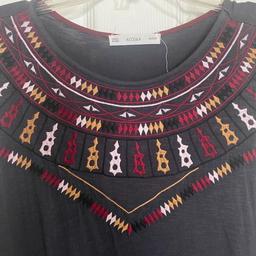 Sleeveless grey tunic